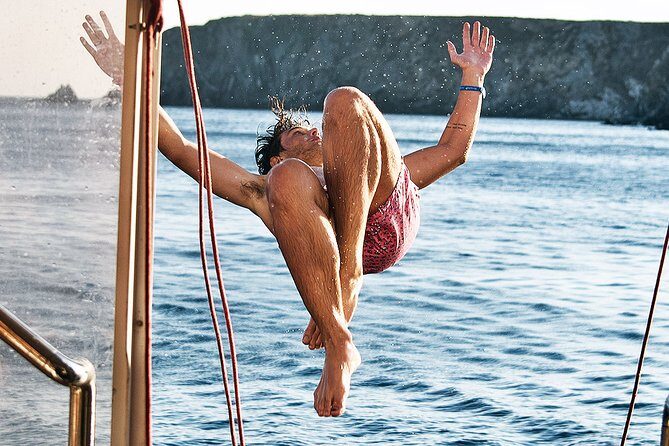 Boat Party with Swimming Stop Experience in Mykonos - Getting to Delos Tours at Mykonos Old Port (and why timing matters)