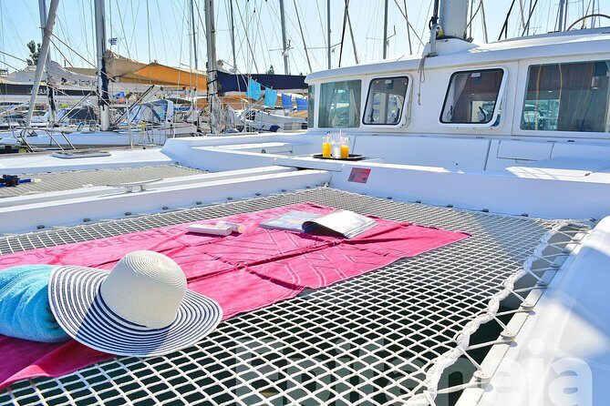 Catamaran cruise in Mykonos with Meal, Drinks & Transport - The sailing route: pirates island, windmills, and Little Venice photos