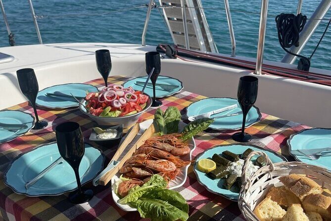 Catamaran cruise in Mykonos with Meal, Drinks & Transport - Food and drinks on board: the all-inclusive part that actually matters