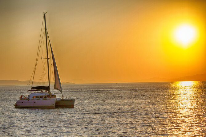 Catamaran Day & Sunset Cruises with meals Drinks and transportation - Food and drinks onboard: homemade rose wine and a real hot meal