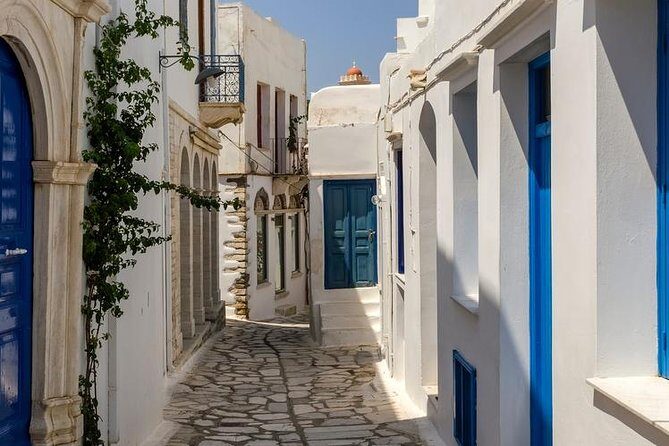 Full Day Boat Trip to Tinos Island from Mykonos - Visiting Panagia of Tinou: Dress Code and Pilgrimage Atmosphere