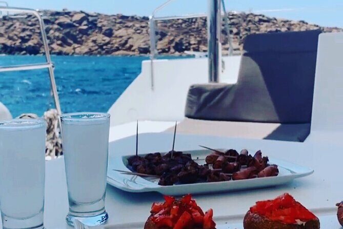 Full Day Discovering Mykonos Delos Renia Tour by Boat - Kalafatis southern beaches: swim first, snack second