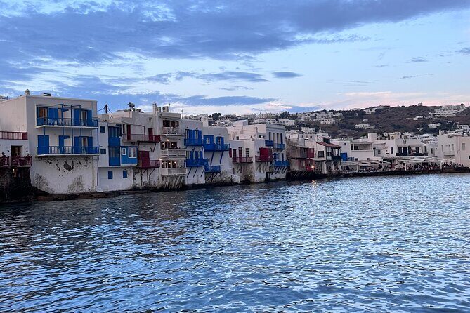 Half-Day Private Cruise with Kaiki around Mykonos - Psarou Beach: sailing past Nammos and the luxe designer scene