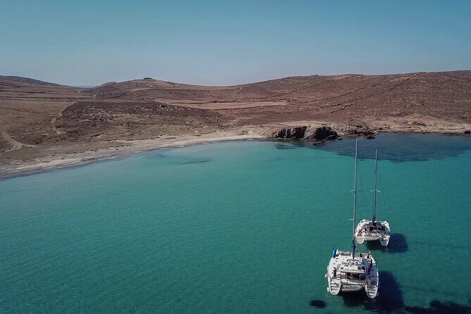 Luxury Catamaran Semi private cruise with meals & drinks and transportation. - Cruising North Mykonos: Views, Breezes, and That Aegean Cut