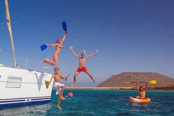 Morning and Sunset Cruise with Meal and Transport Included - Rhenia island swim stop: the part that makes the whole day worth it