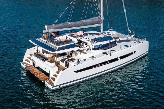 Mykonos: Brand-New Catamaran Cruise with Meal, Drinks & Transport - Getting There: Meeting Point, Pickup, and the Tender-Boat Step