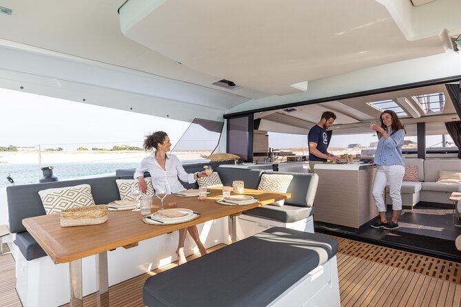 Mykonos: Brand-New Catamaran Cruise with Meal, Drinks & Transport - Catamaran Comfort: Sunbeds, Space, and a Better View for Everyone