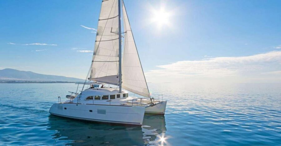 Mykonos: Catamaran Cruise With Meal and Drinks - Sailing along Mykonos coast and the windmills pass