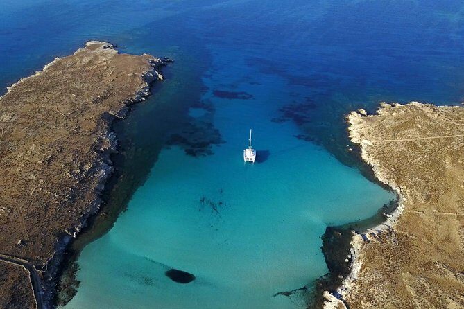 Mykonos Catamaran Full Day Private Cruise, 8-flavor Meal & Drinks - Snorkeling around Rhenia (plus a Delos option if conditions allow)