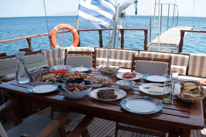 Mykonos: Delos and Rhenia Islands Cruise with BBQ Meal - Stop at Delos: UNESCO ruins with just the right chaos