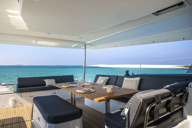 Mykonos: Luxury Catamaran Cruise with Meal, Drinks & Transport - Lunch and drinks onboard: what you’re really paying for