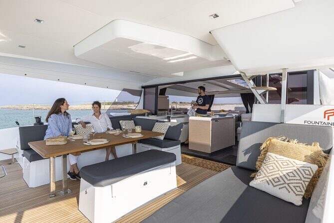 Mykonos: Luxury Catamaran Cruise with Meal, Drinks & Transport - How the pace feels: relaxing sailing with a chance to get active