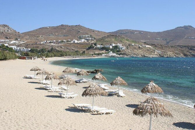 Private Cruise with Handmade Antique Boat around Mykonos-Full Day - Stop 1: Psarou Beach and Nammos village shopping time