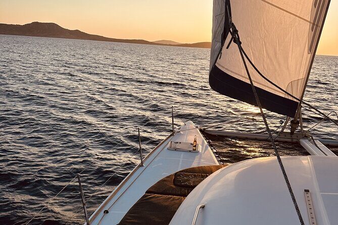 Private Mykonos Catamaran Day Cruise with Meals & Water Toys - Stop 3: Rineia and the Payoff of Secluded Coves