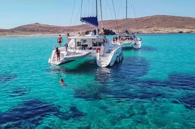 Private Sunset Cruise Including Meals And Drinks - Rhenia cove: where the swimming and snorkeling happen