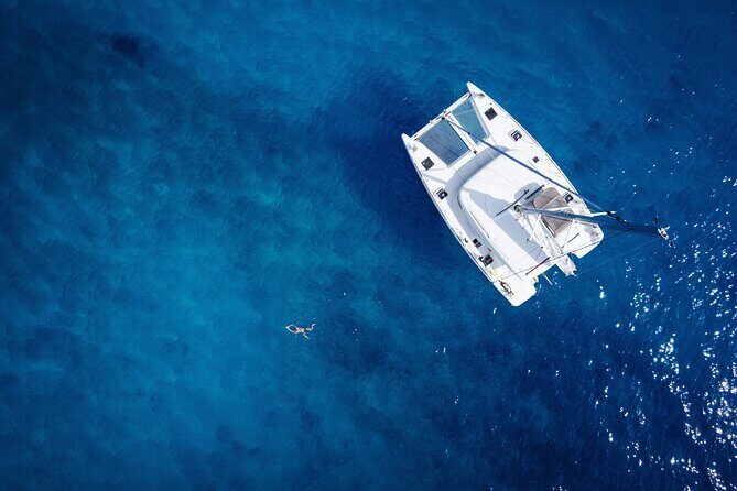 Semi Private Cruise with luxury Catamaran in Delos and Rhenia islands - How the Route Works: Baos Island, Delos Passing, Then Rhenia