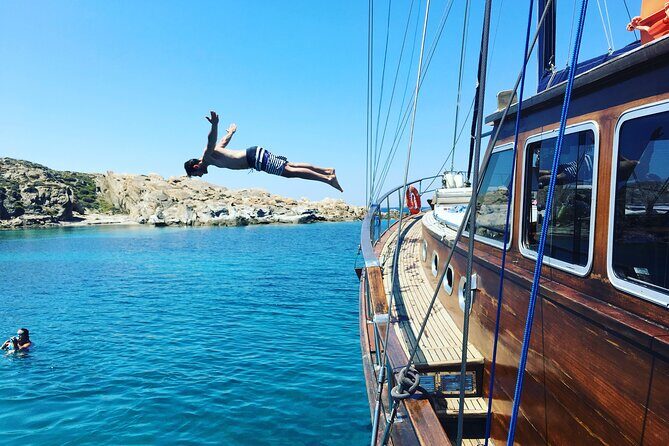 Shared Mykonos Sail Cruise to Delos and Rhenia Islands - Food and Drinks on Board: BBQ, Greek Salad, and Included Drinks